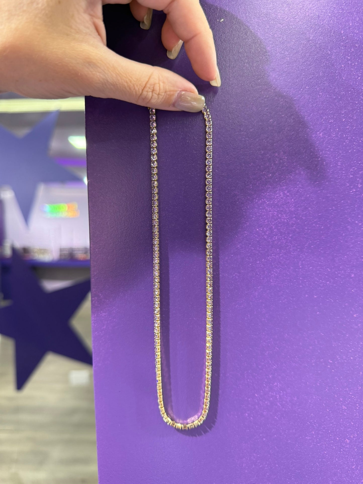 Cadena de tenis morada