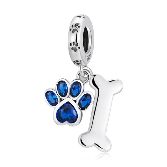 Charm de plata 925 - huellita con brillo