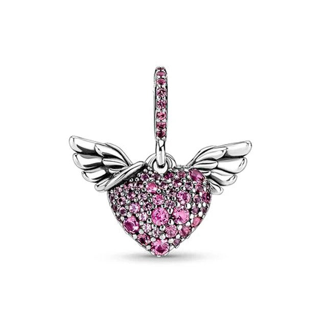 Charm de plata 925 - corazón con brillos y alas